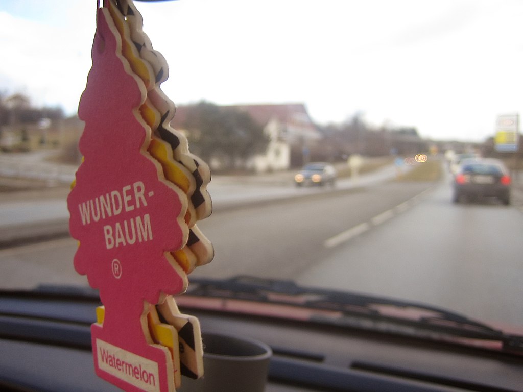 Wunder Baum hanging from a car window (Known as Little Trees in most English-speaking countries)