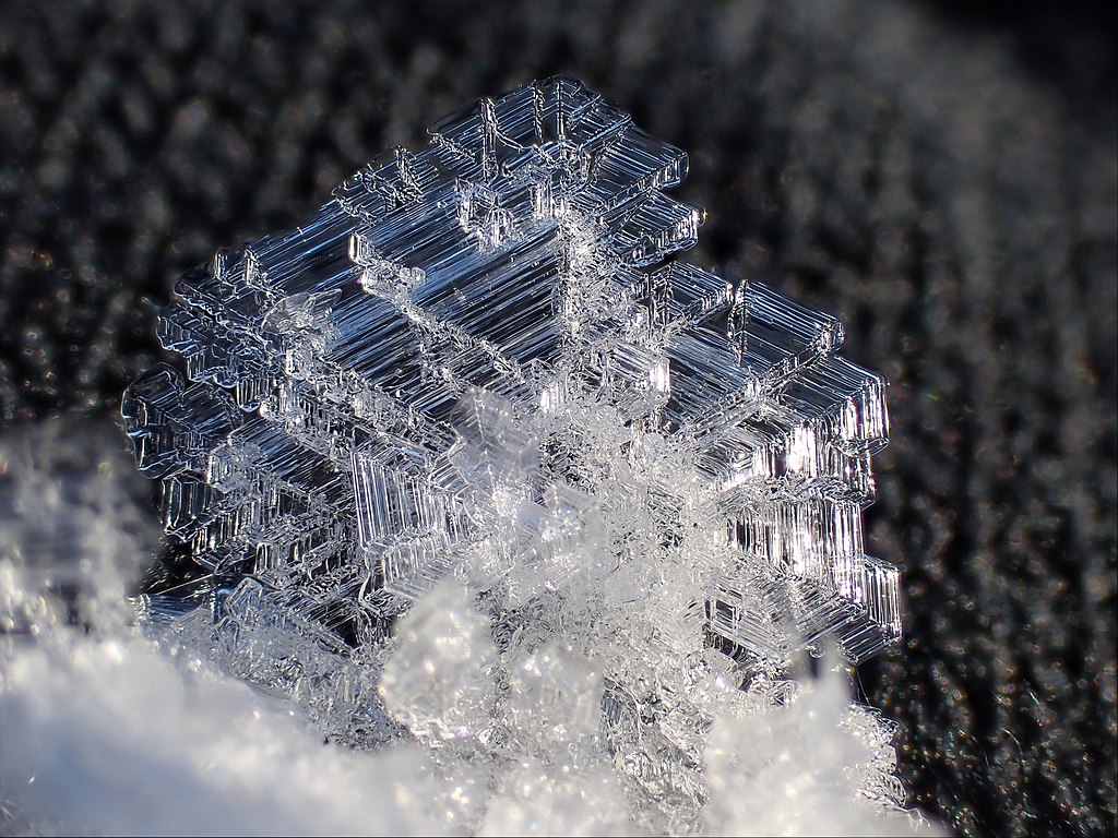 nearly flat ice crystal formed by light wind near the ground