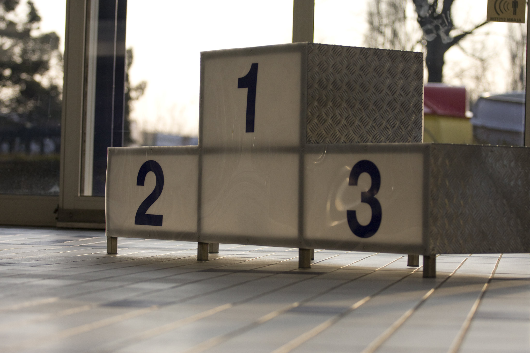 An empty podium for first, second and third place.