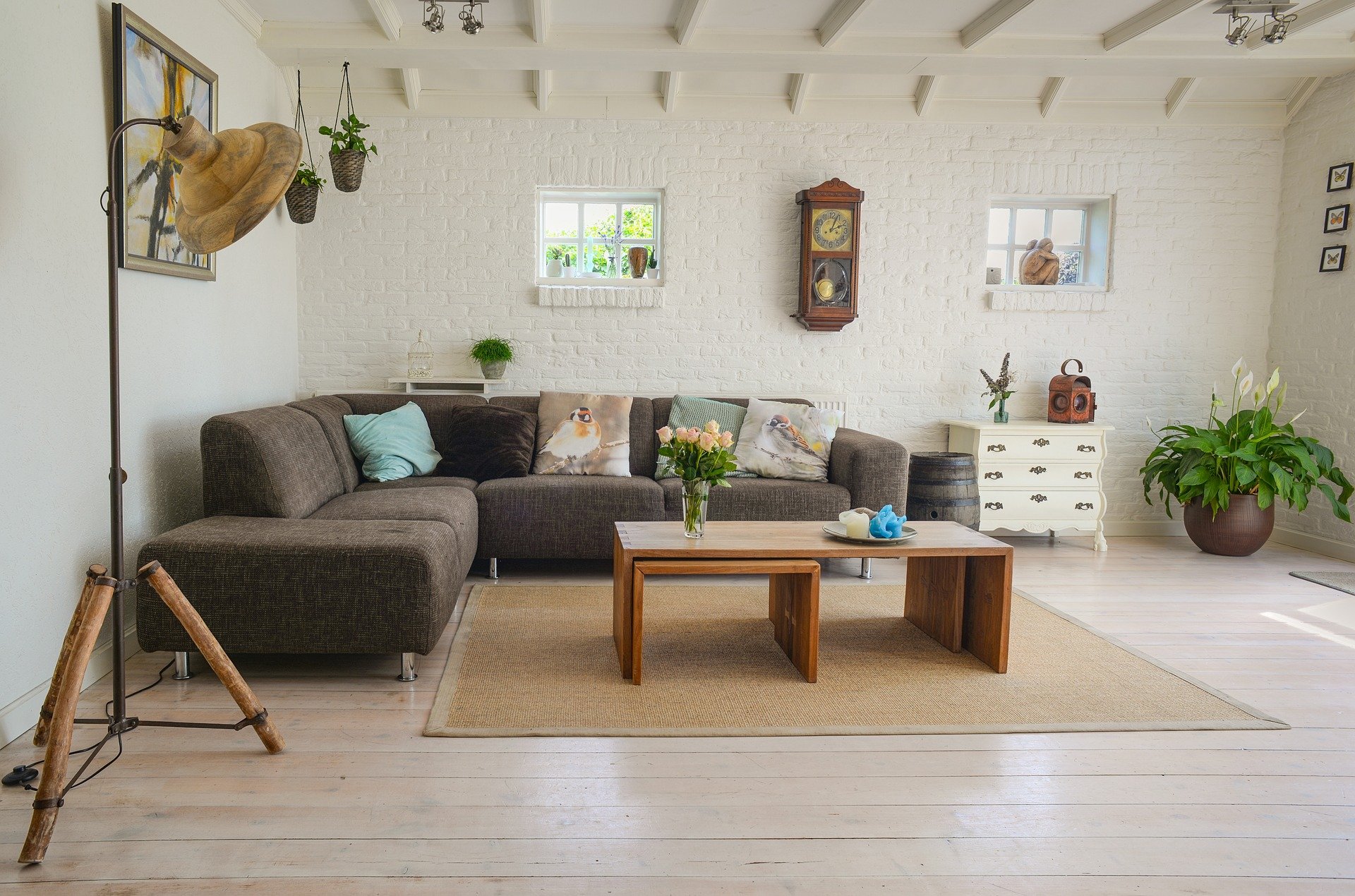 A living room with nice furniture placed with good amount of space to move around.